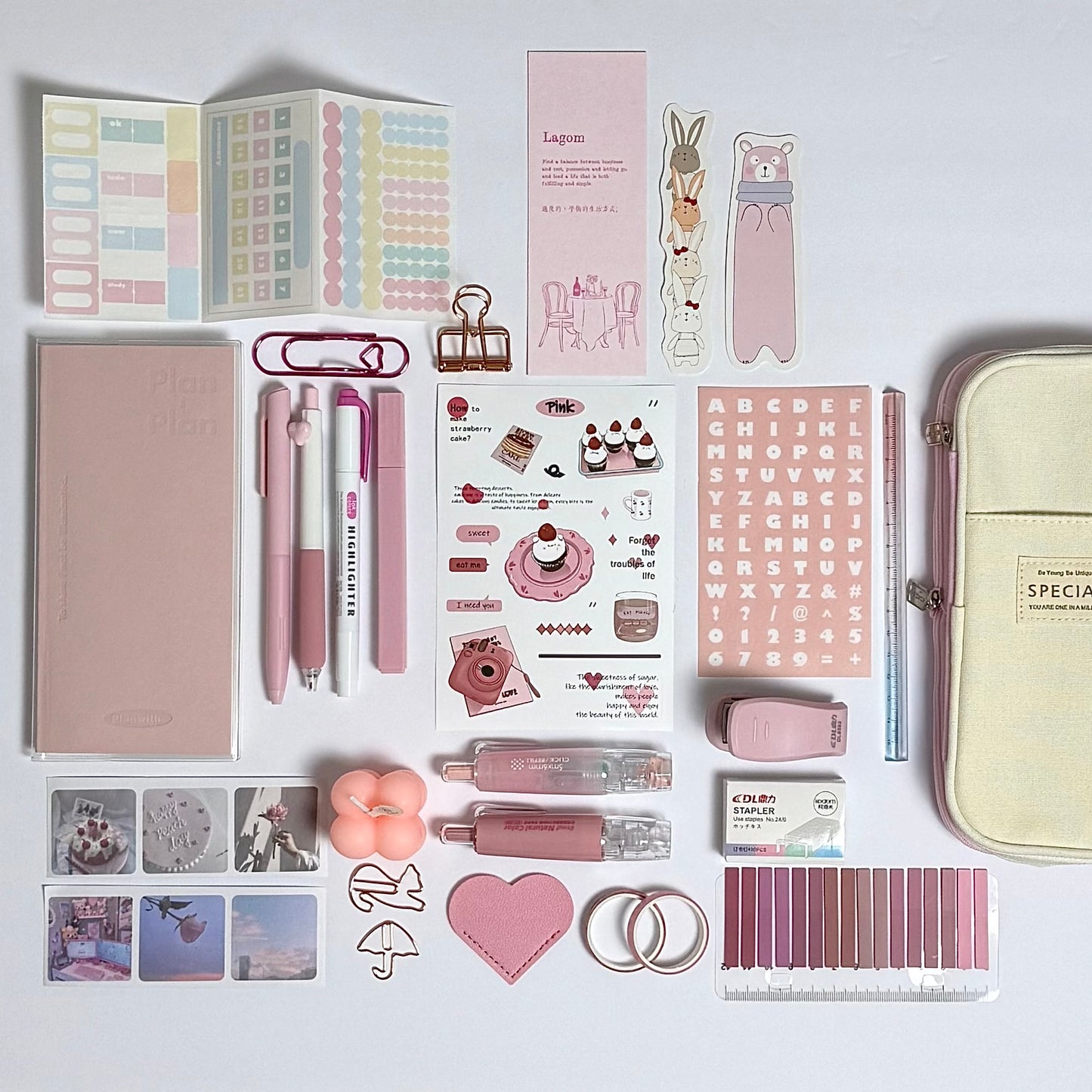 Pink planner and journaling stationery set for planning and organization