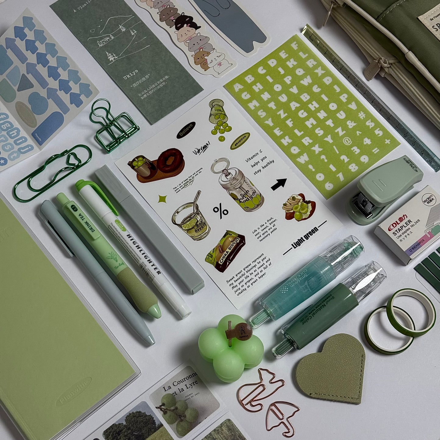 Green aesthetic planner and stationery set with journal, pens, stickers and pencil case