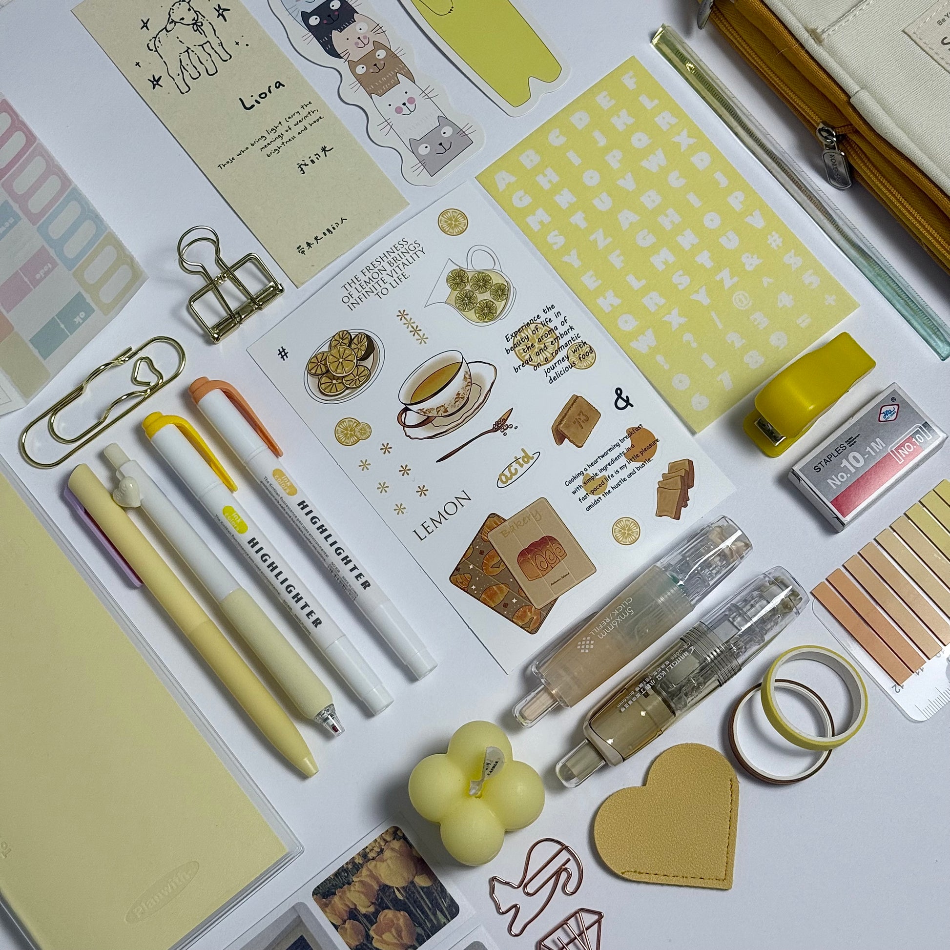 Yellow aesthetic planner and stationery set with journal, pens, stickers and pencil case