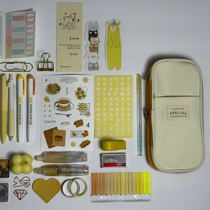 Yellow aesthetic planner and stationery set with journal, pens, stickers and pencil case
